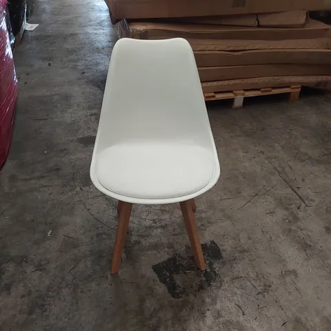 DESIGNER WHITE PLASTIC DINING CHAIR WITH PADDED SEAT