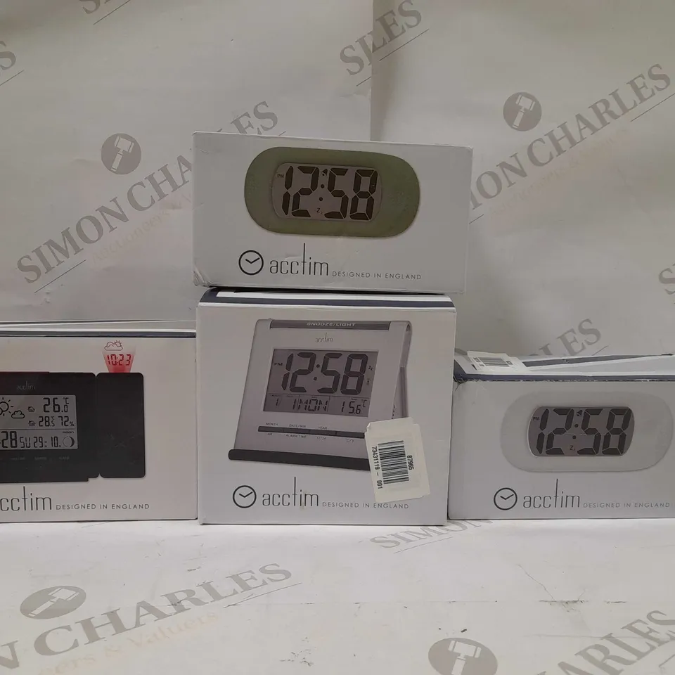 LOT OF APROX 4 ACCTIM DIGITAL CLOCKS