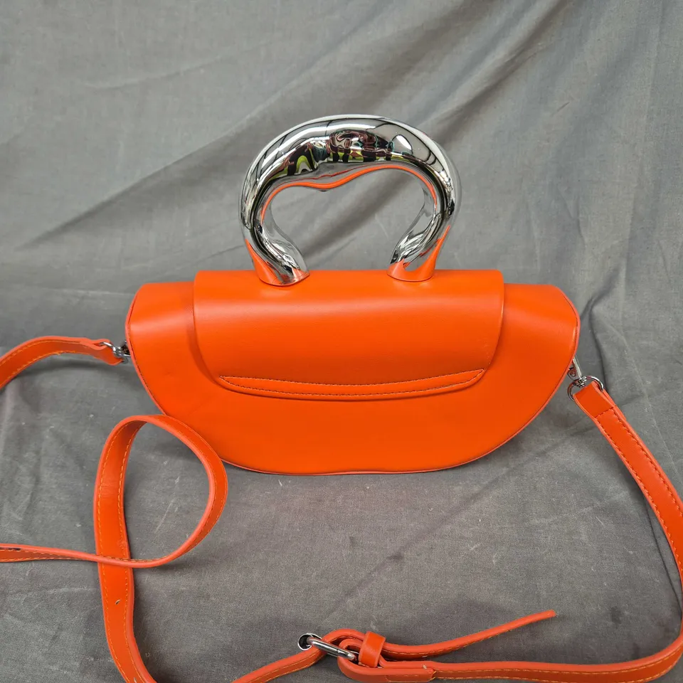 Orange handbag with chrome arched handle – fashion bag