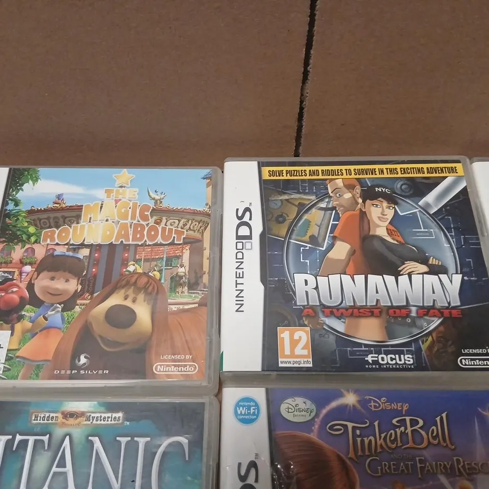 NINTENDO DS HANDHELD GAMES CONSOLE WITH FOURTEEN ASSORTED GAMES 