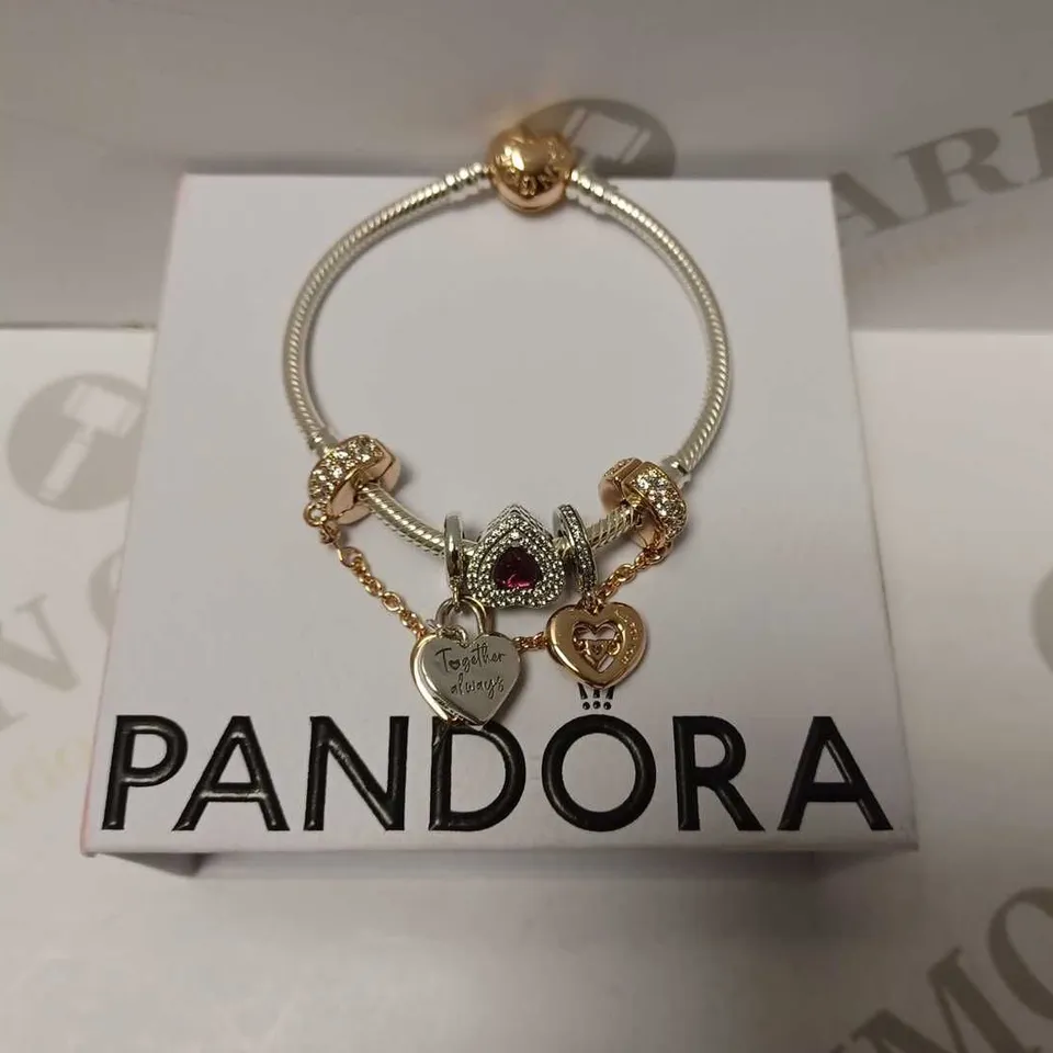 PANDORA SILVER BRACELET WITH CHARMS 