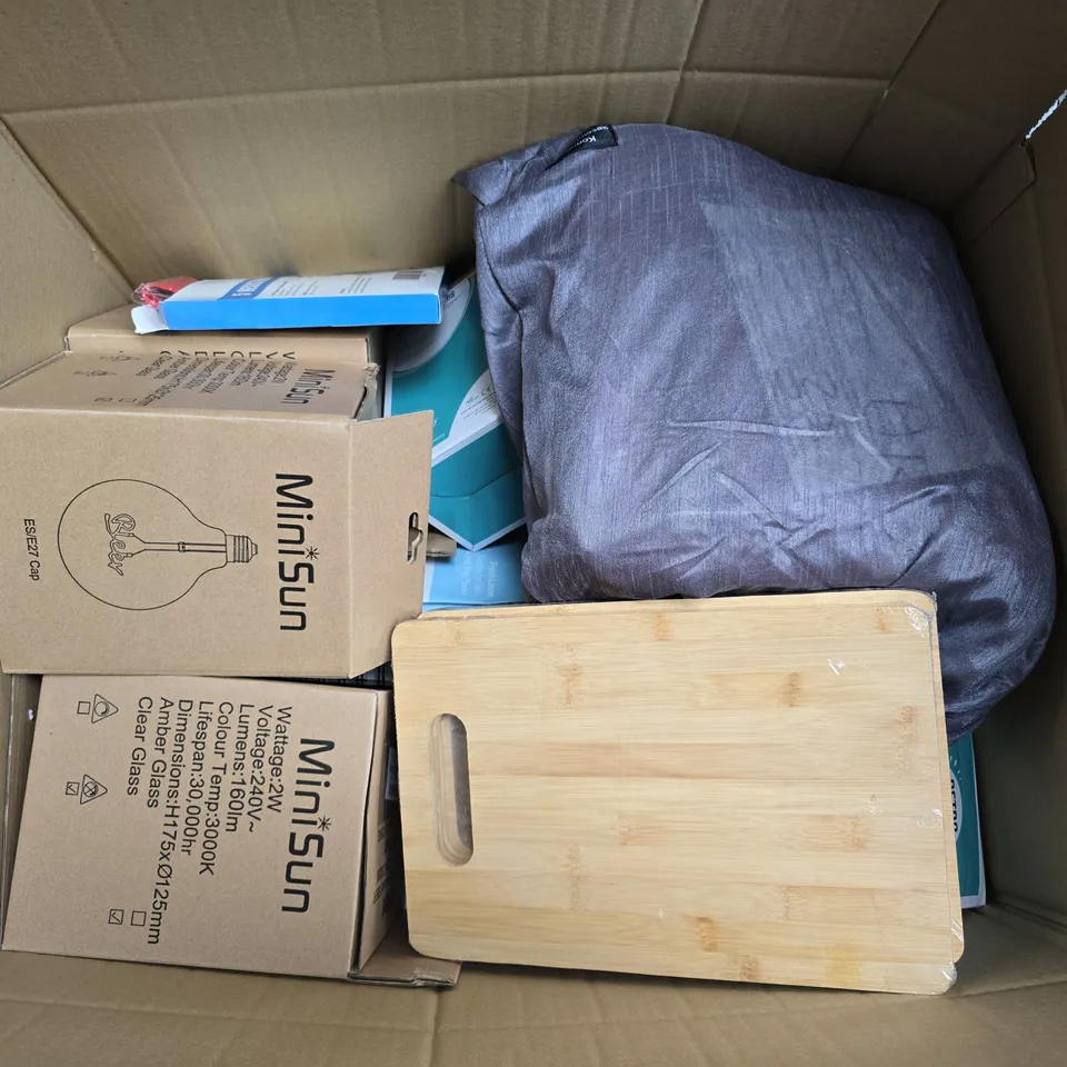 APPROXIMATELY 10 ASSORTED HOUSEHOLD PRODUCTS TOO INCLUDE LIGHT BULBS , KITCHEN BOARDS , NOTEBOOKS , ETC - COLLECTION ONLY 