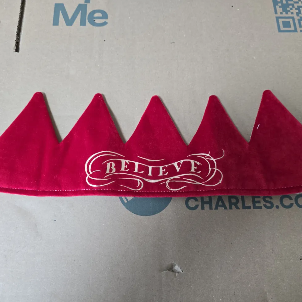 FABLE HEART  RED CROWN HEADBAND WITH 'BELIEVE' MOTIF; WHITE FABRIC DRAWSTRING POUCH