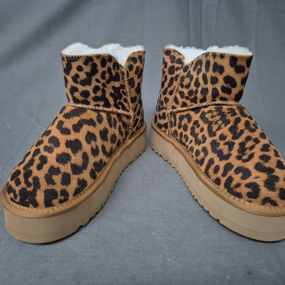 BOXED PAIR OF UGG SHOES IN ANIMAL PRINT UK SIZE 6