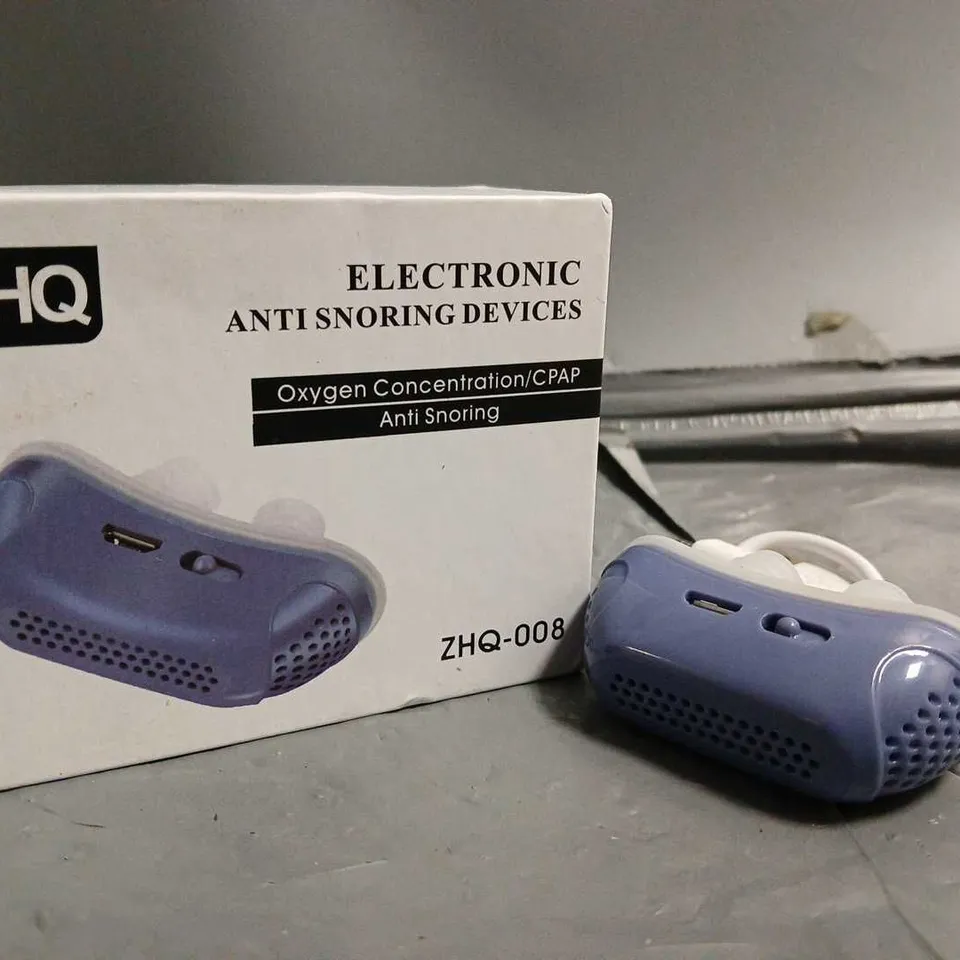 BOXED ZHQ ELECTRONIC ANTI SNORING DEVICE