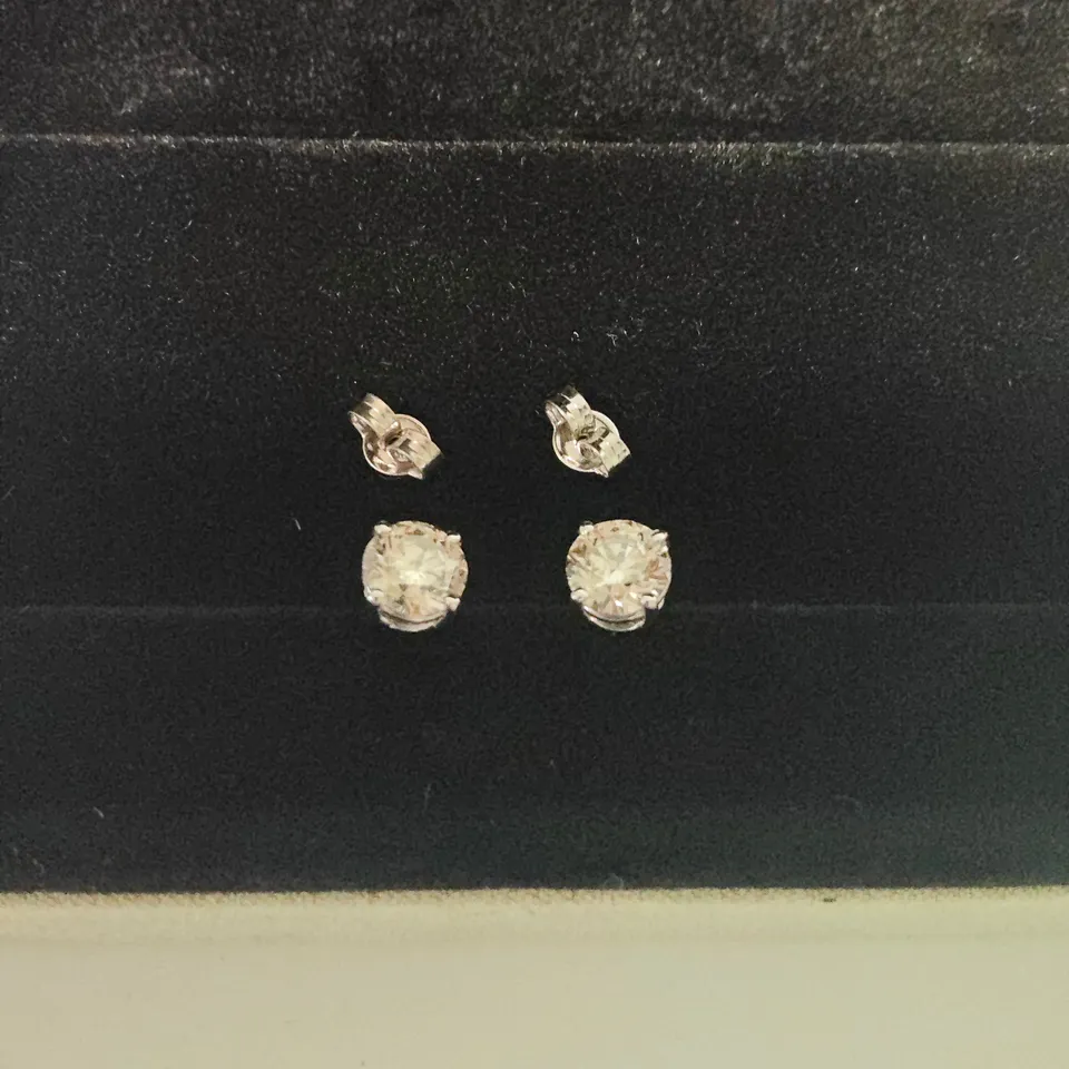 18CT WHITE GOLD STUD EARRINGS SET WITH NATURAL DIAMONDS WEIGHING +-2.03CT