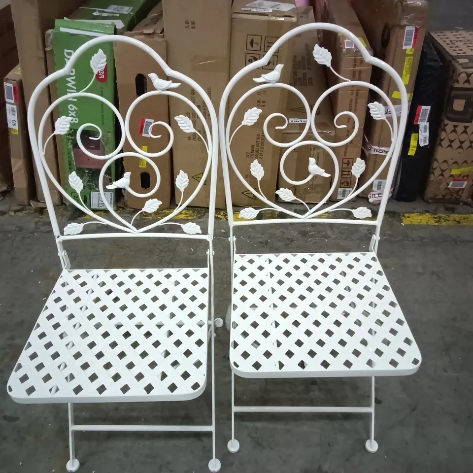 PAIR OF WHITE METAL FOLDING CHAIRS