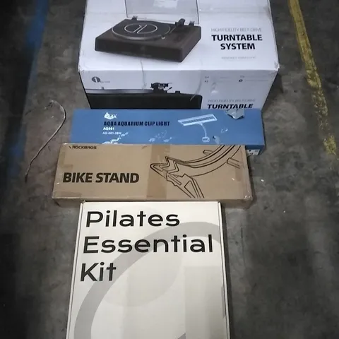 PALLET OF HOUSEHOLD ITEMS TO INCLUDE TURNTABLE SYSTEM, AQUARIUM CLIP LIGHT, BIKE STAND, PILATES KIT AND OTHER ASSORTED ITEMS...