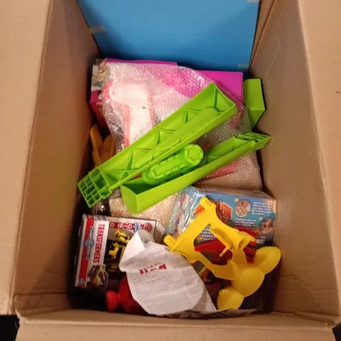 Assorted children's toys and craft items in a box