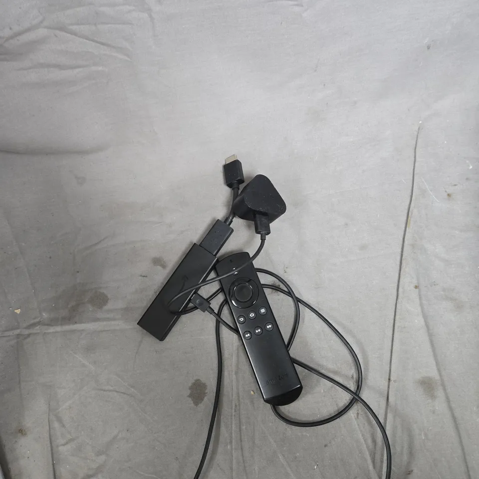 TOTE OF APPROXIMATELY 15 ASSORTED ITEMS TO INCLUDE: AMAZON FIRESTICK