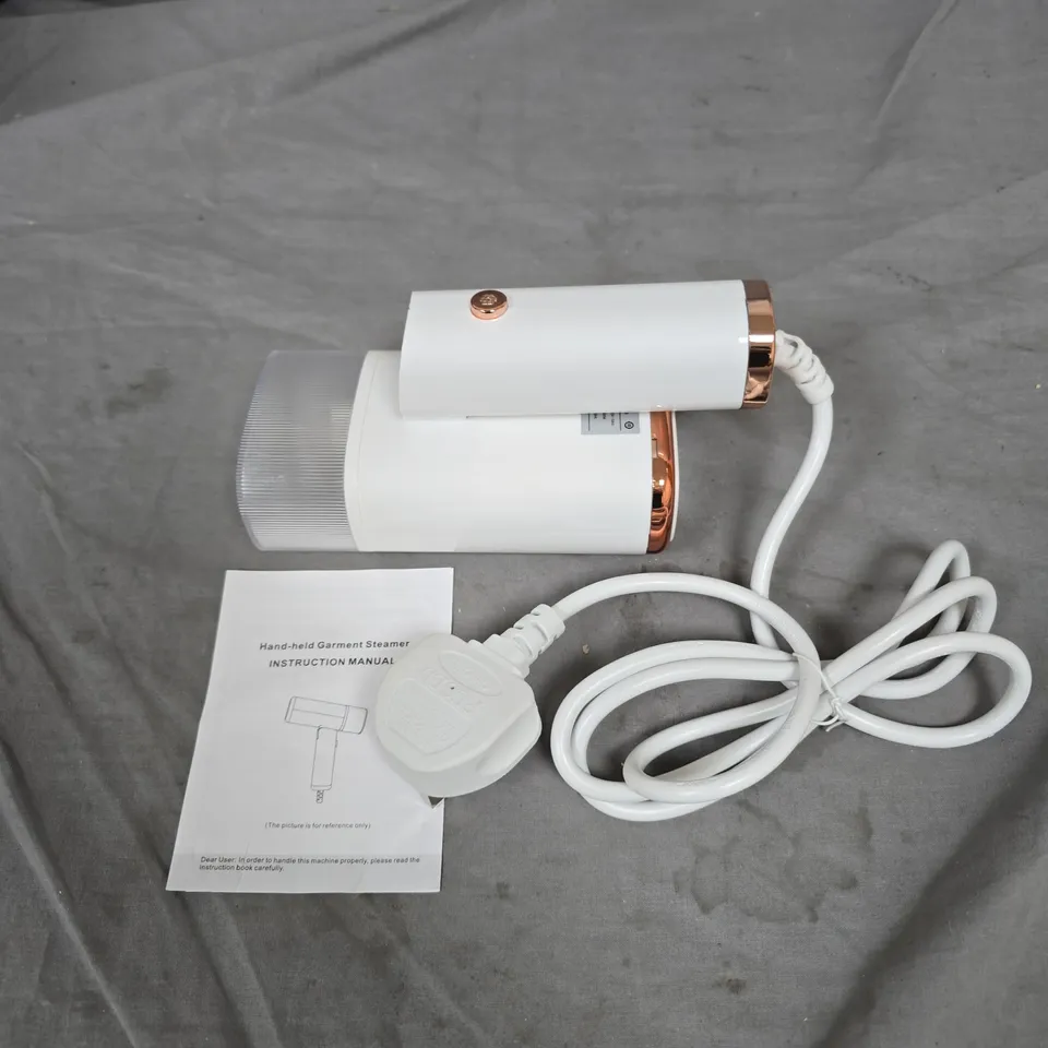 HANDHELD GARMENT STEAMER