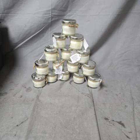 APPROXIMATELY 30 SMALL GLASS JAR CANDLES.