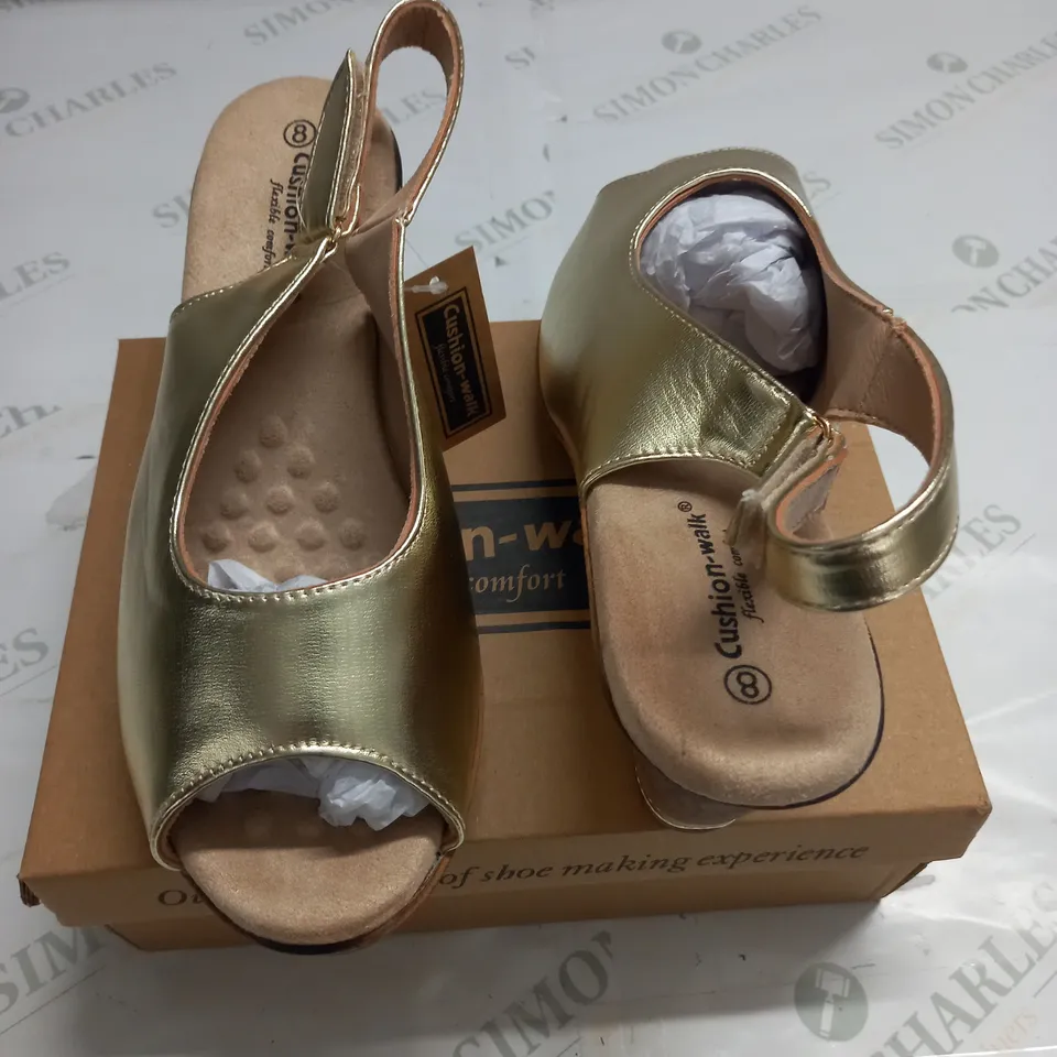 BOXED PAIR OF CUSHION WALK GOLD WEDGE HEELED SHOES - 8