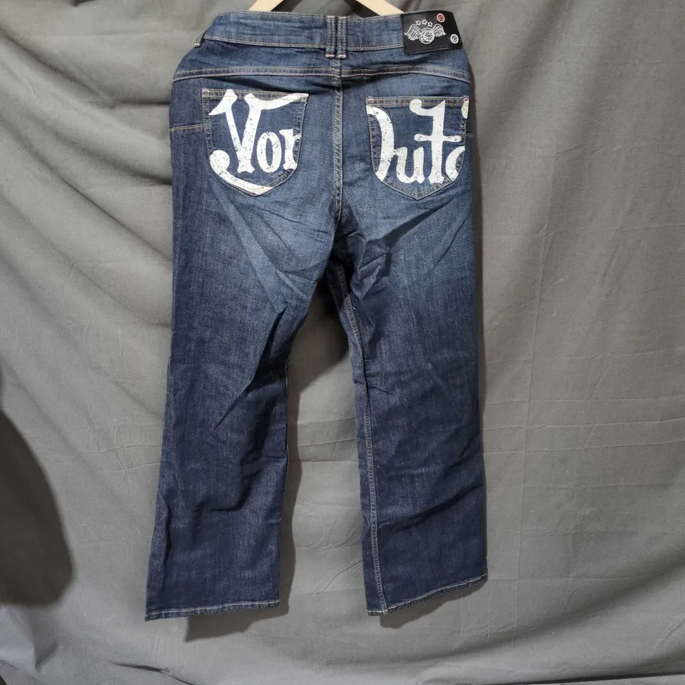 BERSHKA DENIM JEANS – BLUE WASH WITH BACK POCKET GRAPHICS VON DUTCH SIZE 10 UK