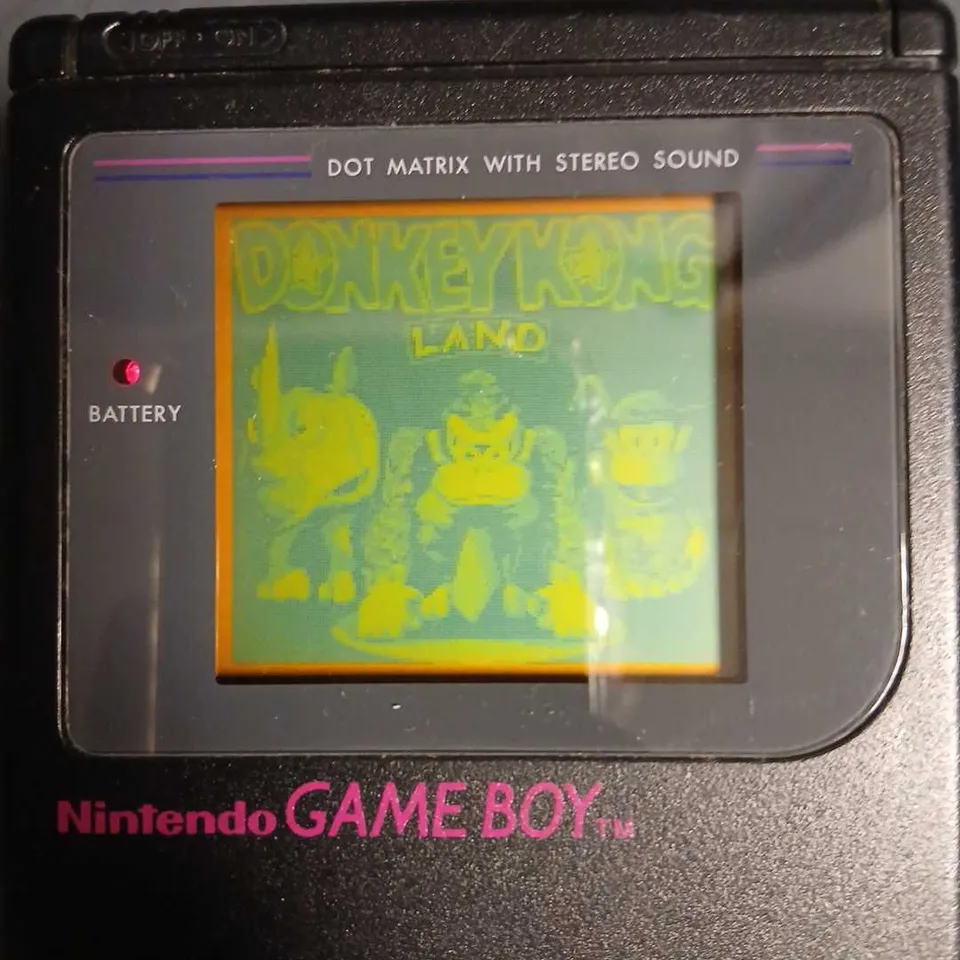 NINTENDO GAME BOY HANDHELD CONSOLE WITH MULTIPLE CARTRIDGES AND ORIGINAL BOX