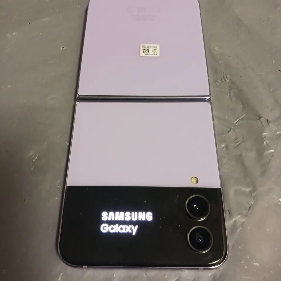 UNBOXED SAMSUNG GALAXY FOLDING PHONE IN PURPLE - 128GB SM-F721B