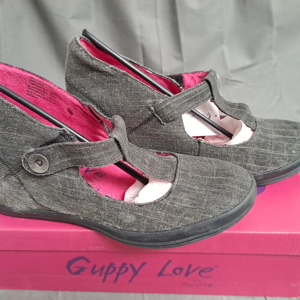 BOX OF APPROXIMATELY 12 PAIRS OF BLACK GUPPY LOVE WEDGE SHOES IN VARIOUS SIZES 