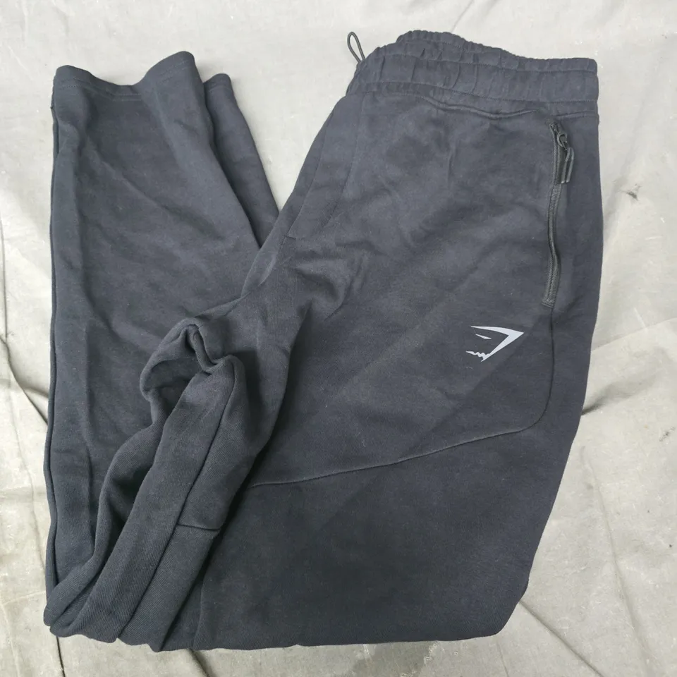 GYMSHARK INTERLOCK TECH JOGGERS IN BLACK - LARGE