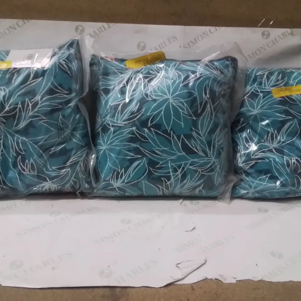 Brand new sealed set of 3 oasis cusion blue