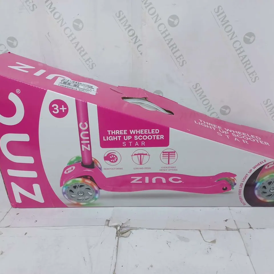 BOXED AND SEALED ZINC 3 WHEELED LIGHT UP STAR SCOOTER  RRP £39.99