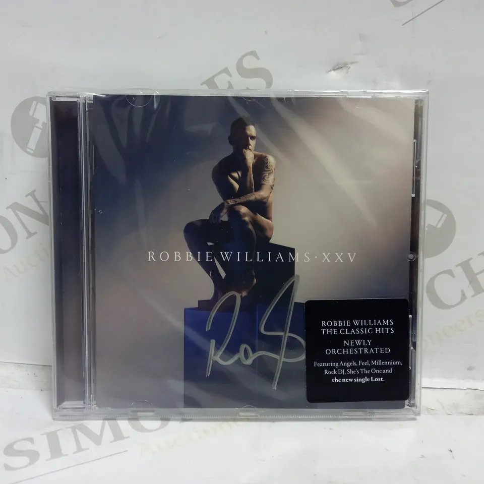 ROBBIE WILLIAMS XXV SIGNED ALBUM