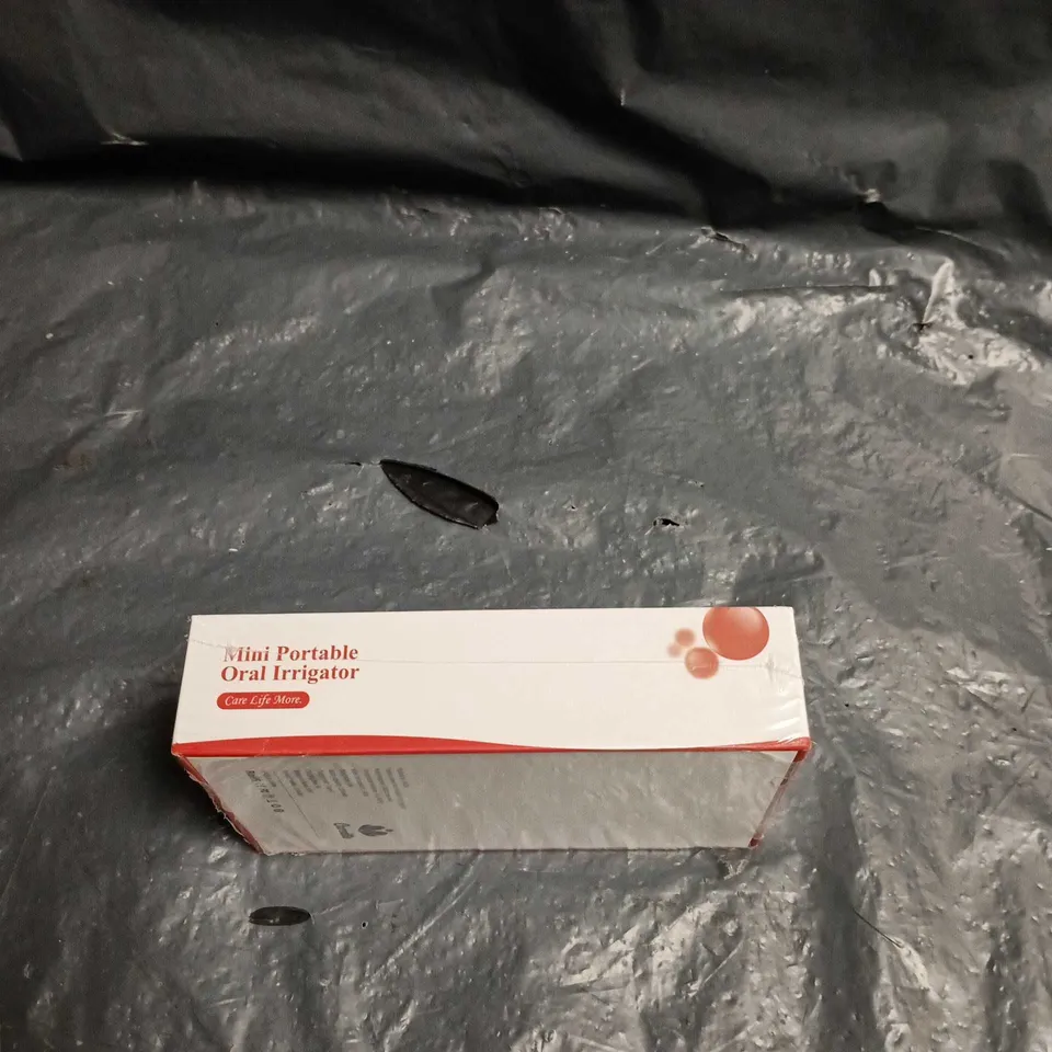 CAREDITE DENTAL ORAL IRRIGATOR DEVICE – BOXED