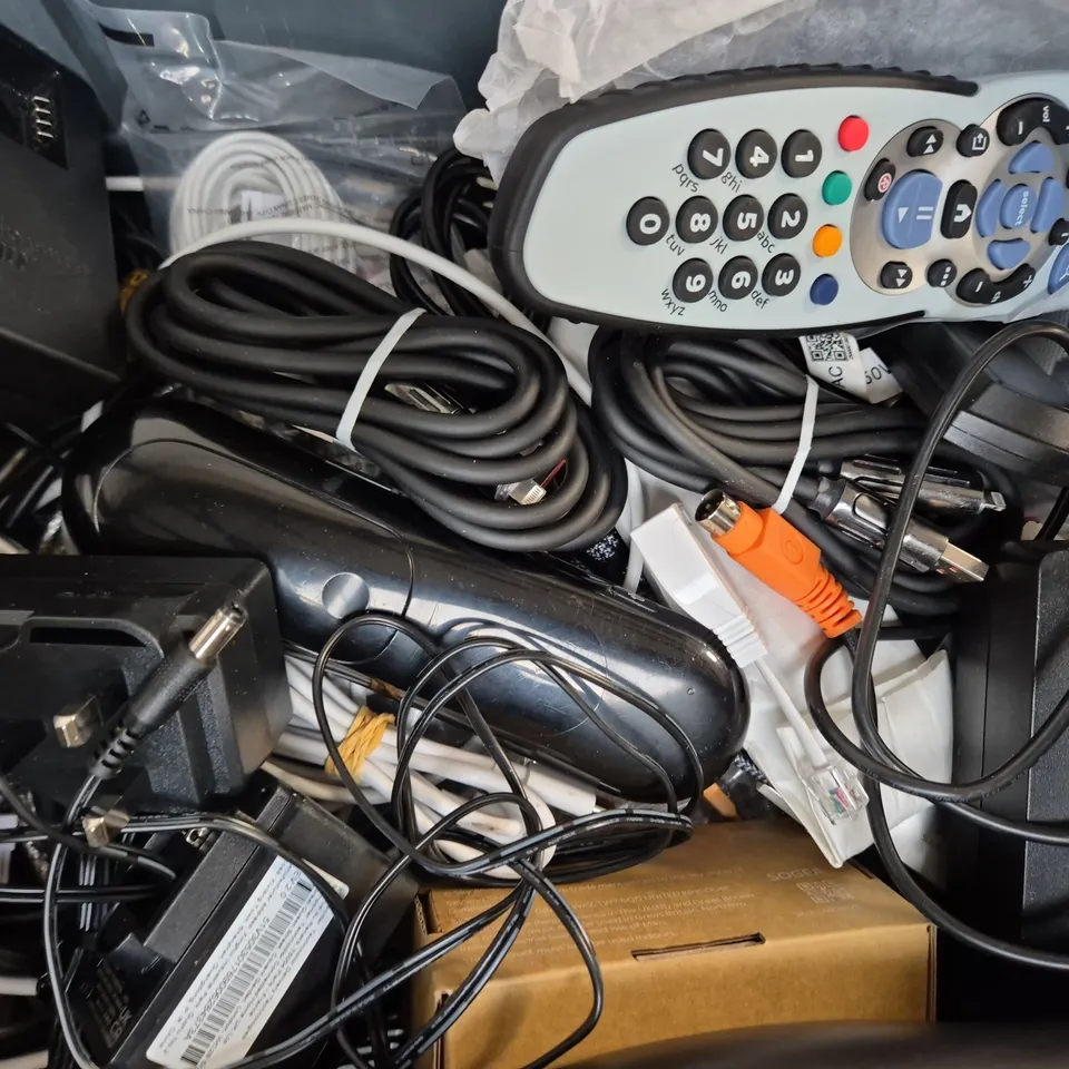 APPROXIMATELY 10 ASSORTED HOUSEHOLD ITEMS TO INCLUDE SKY WI-FI ROUTER, VARIOUS CABLES AND POWER ADAPTERS, ETC