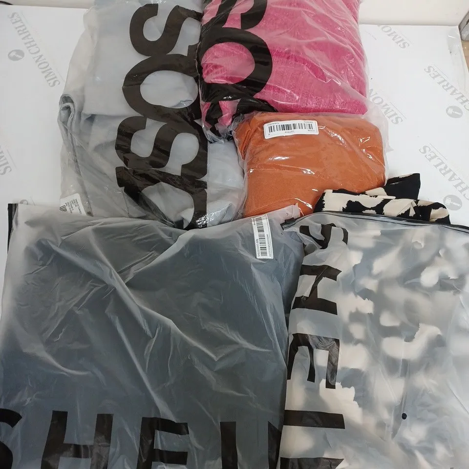 LARGE BOX OF ASSORTED CLOTHING ITEMS IN VARIOUS COLOURS AND SIZES INCLUDING TROUSERS , TOPS AND JUMPERS 