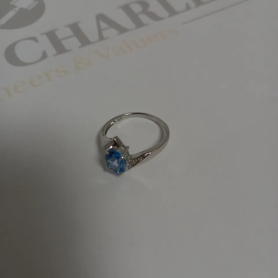 DESIGNER 9CT WHITE GOLD BLUE TOPAZ AND DIAMOND DRESS RING, +-1.35CT