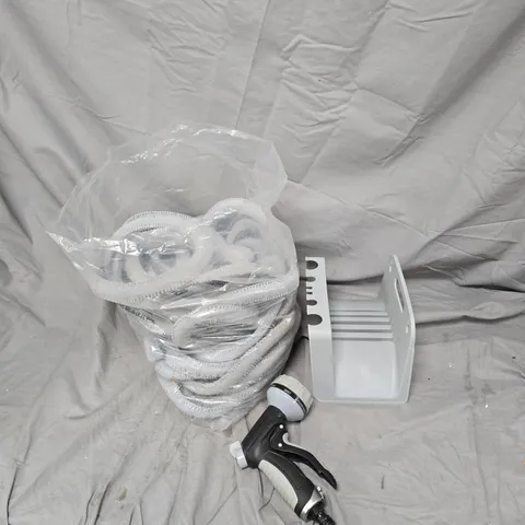 GARDEN HOSE SPRAY GUN KIT WITH COILED HOSE AND HOSE HOLDER NOT TESTED 