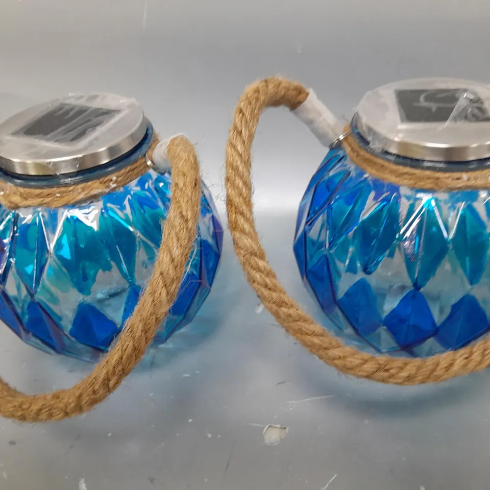 BOXED BELL AND HOWELL SET OF 2 SOLAR JAR LIGHTS