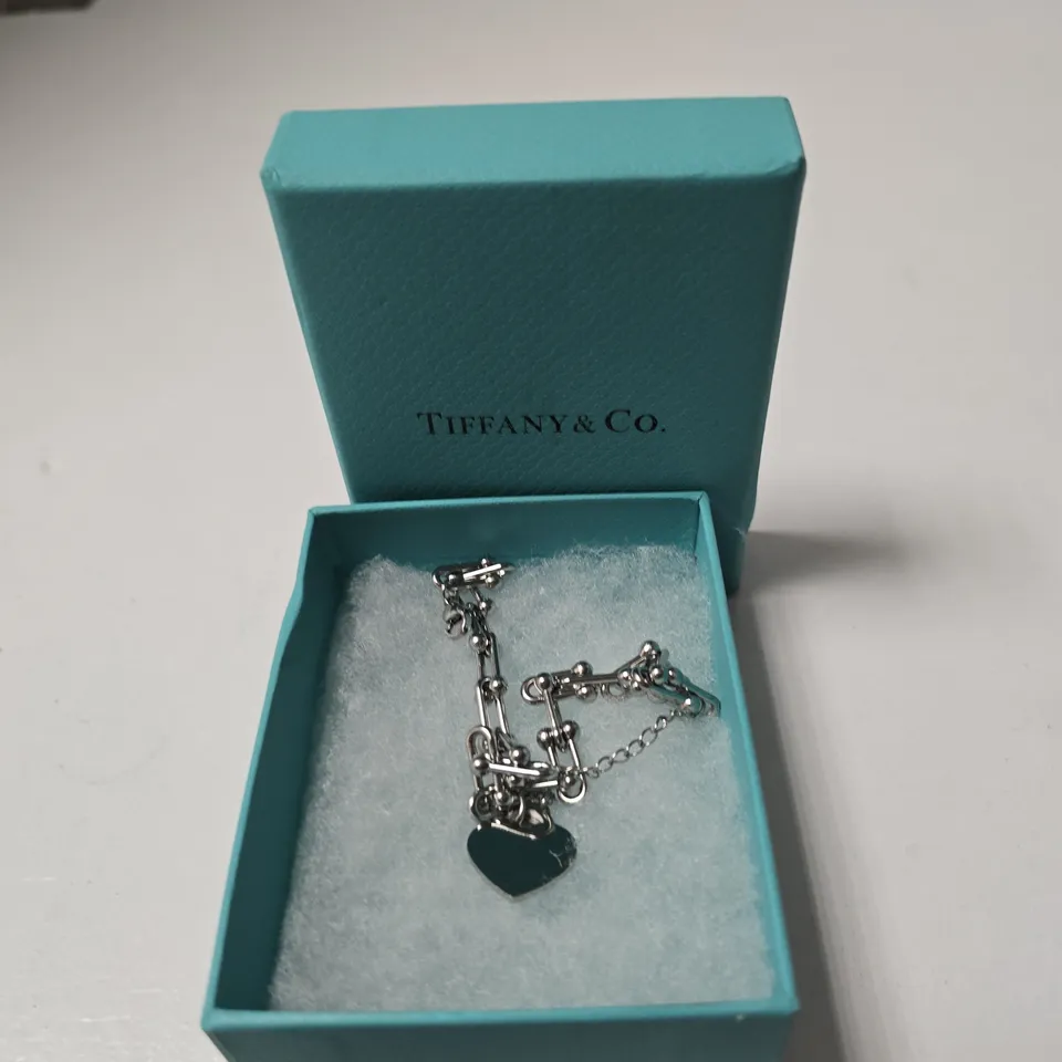 TIFFANY & CO. SILVER HEART PENDANT BRACELET  – BOXED