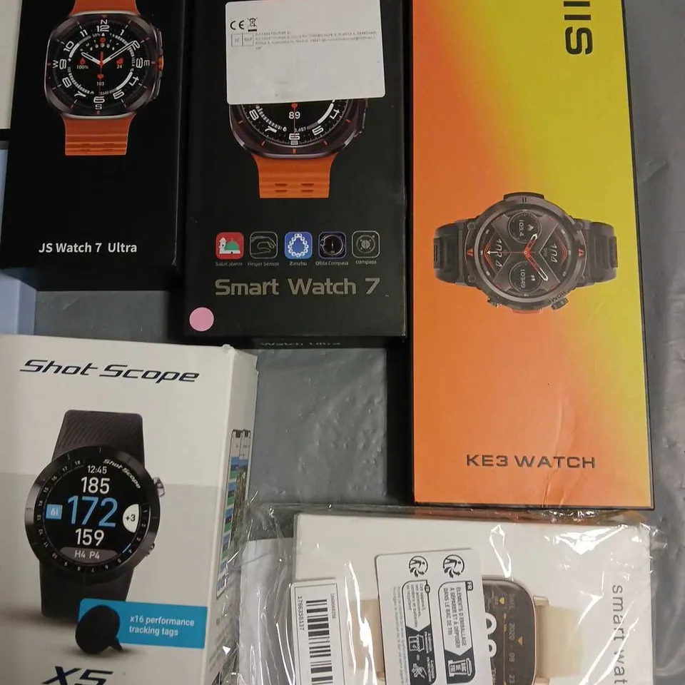 LOT OF APPROXIMATELY 11 ASSORTED BOXED SMART WATCHES