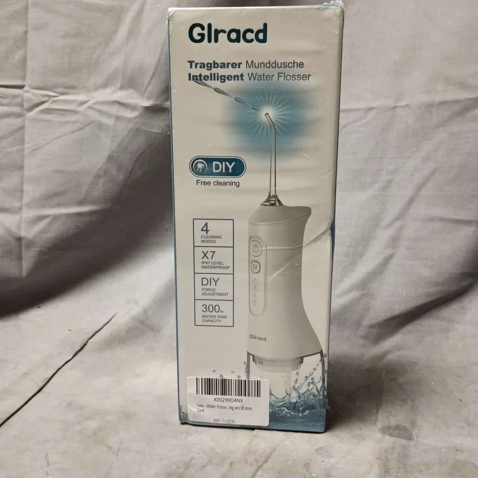 GLRACD PORTABLE WATER FLOSSER – HANDHELD ORAL IRRIGATOR. SEALED