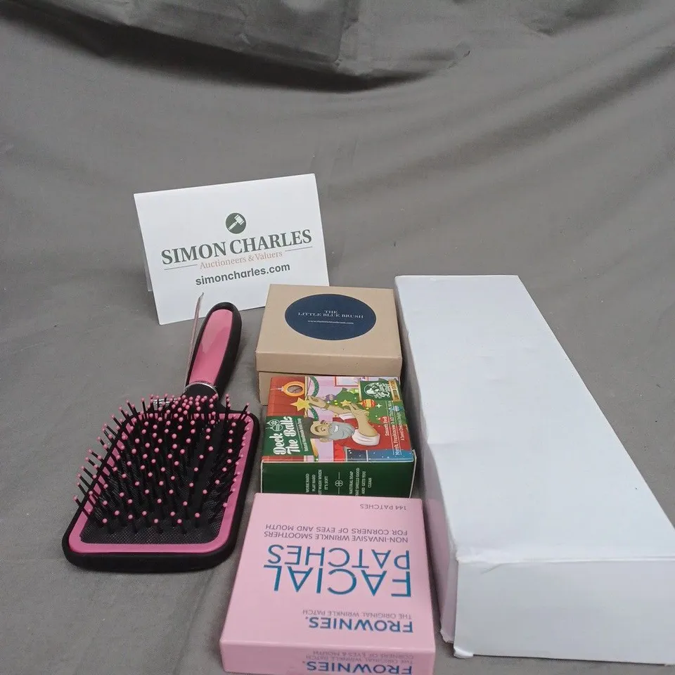 TOTE OF ASSORTED COSMETIC ITEMS TOO INCLUDE , HAND CREAM , HAIRBRUSHES , ETC 