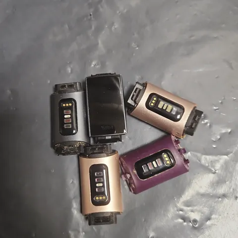 LOT OF APPROXIMATELY 5 FITBIT CHARGE 3 WATCHES - ASSORTED COLOURS - NO STRAPS INCLUDED