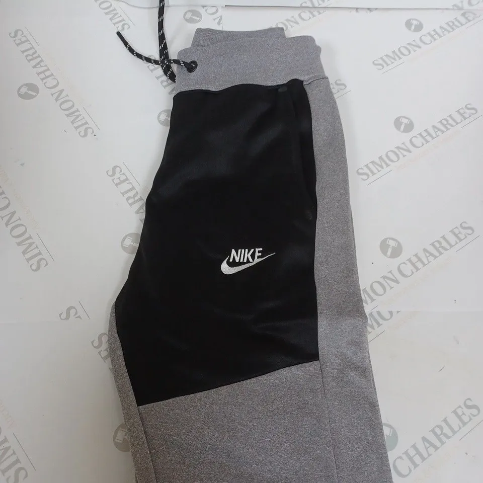 NIKE LOGO FLEECED TRACKSUIT BOTTOMS SIZE UNSPECIFIED