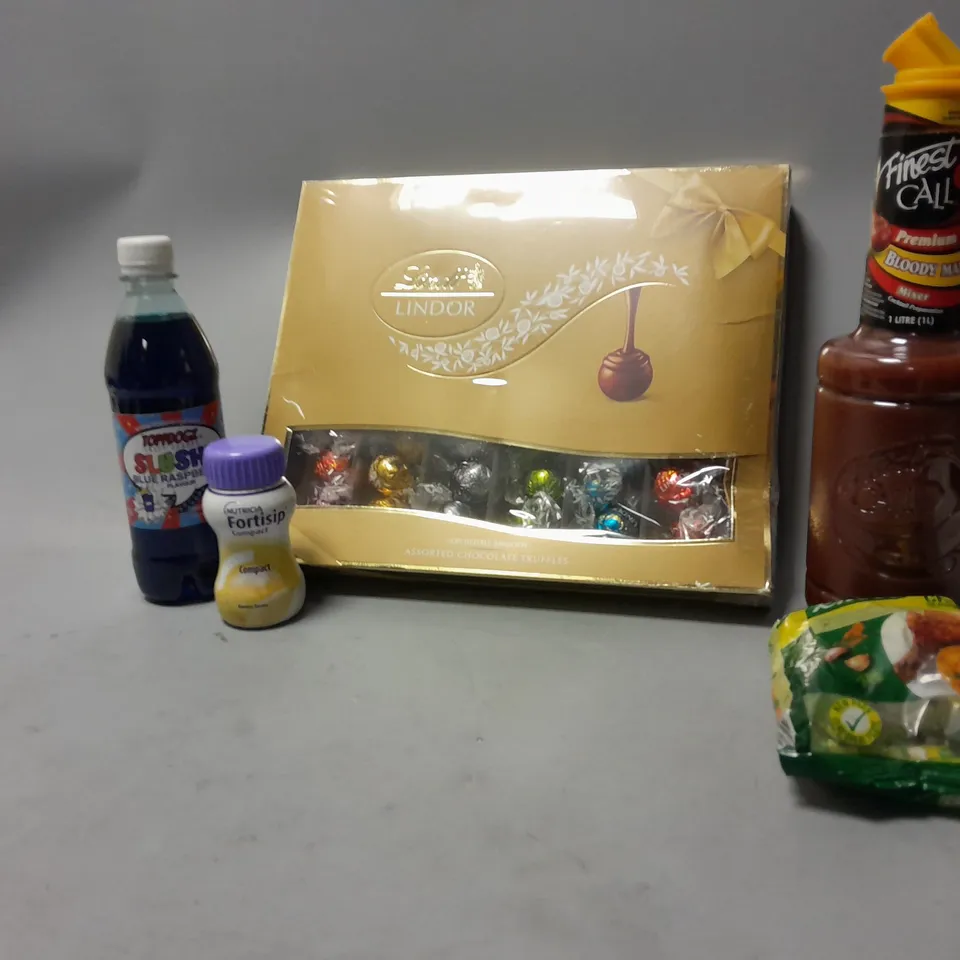 LOT OF ASSORTED FOOD ITEMS TO INCLUDE LINDOR CHOCOLATES, BLOODY MARY MIXER, ETC