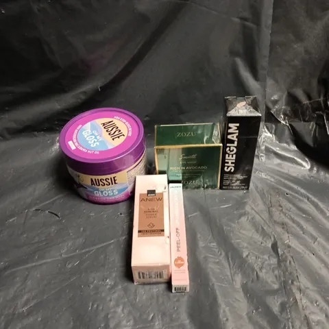 APPROXIMATELY 15 ASSORTED ITEMS OF COSMETICS INCLUDING AUSSIE OH MY GLOSS HAIR MASK, SHEGLAM MATTE FOUNDATION, AVON ANEW SKIN RENEWAL AND PEEL OFF LIP LINER