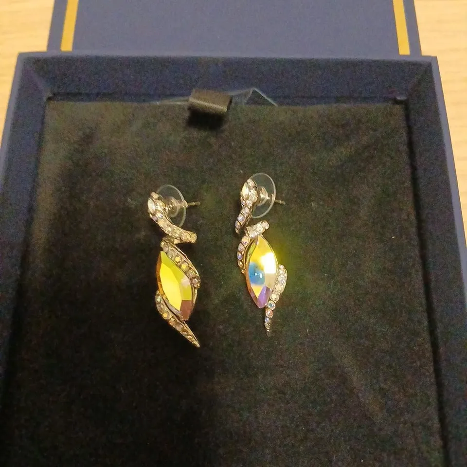 BUTLER & WILSON COILED SERPANT EARRINGS 