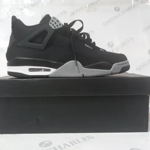 BOXED PAIR OF NIKE AIR JORDAN 4 RETRO SHOES IN BLACK UK SIZE 10