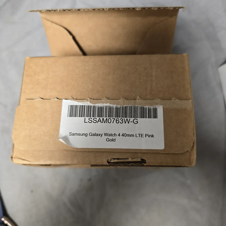 SAMSUNG GALAXY WATCH 4 40MM LTE PINK GOLD WITH BLUE SILICONE STRAP