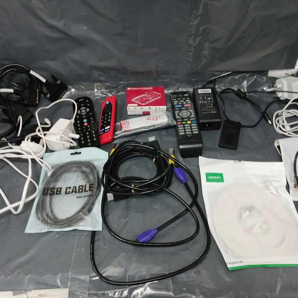 BOX OF APPROXIMATELY 8 ASSORTED ITEMS TO INCLUDE - RASPERRY PI, USB CABLE, AND REMOTES ETC. 