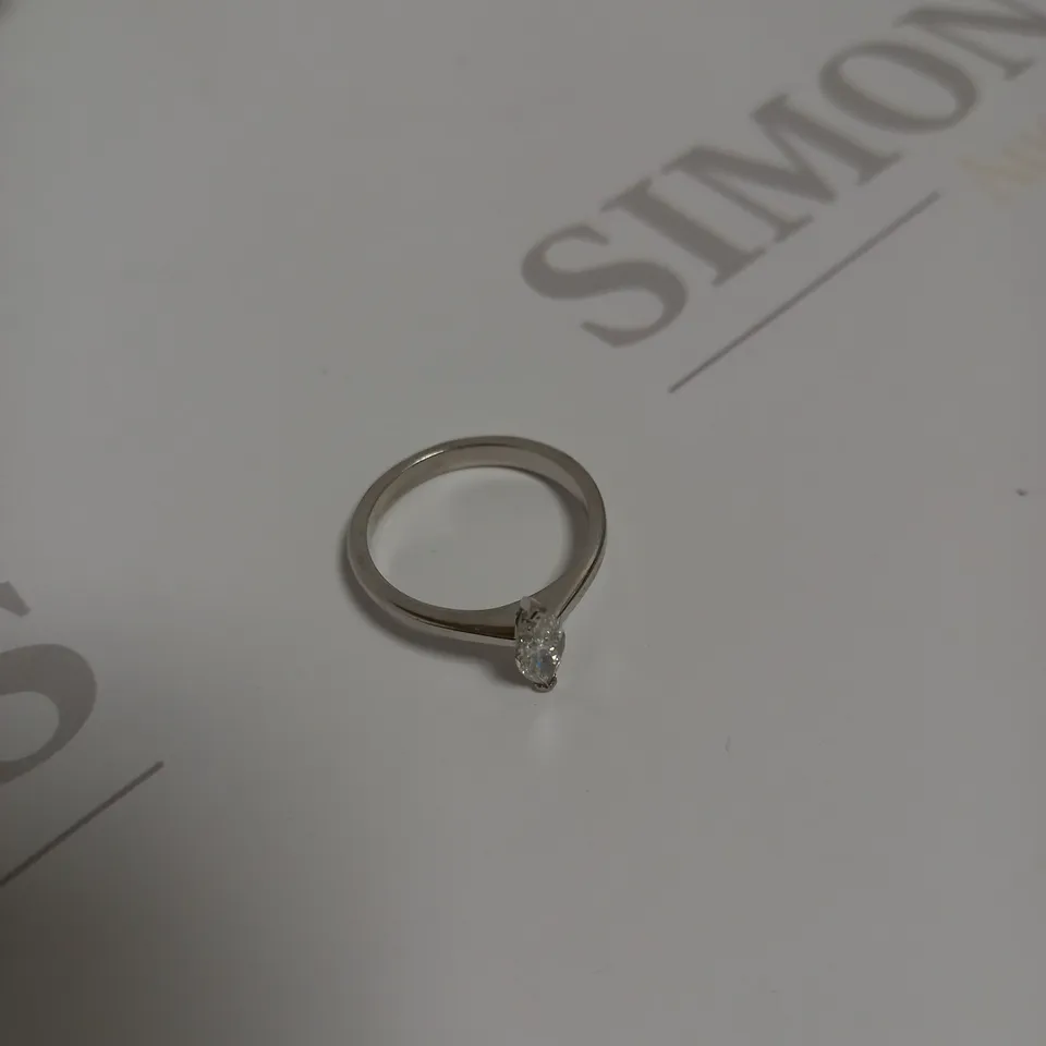 DESIGNER 18CT WHITE GOLD RING SET WITH A MARQUISE CUT DIAMOND WEIGHNG +-0.50CT