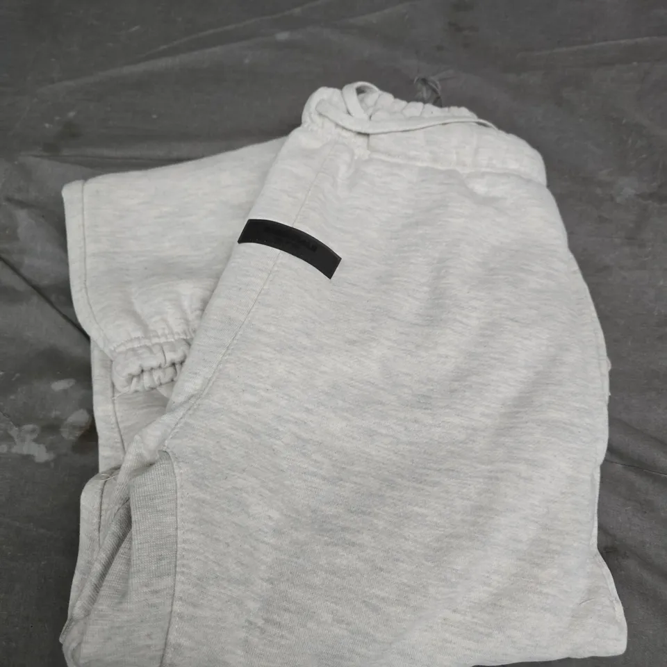 FEAR OF GOD ESSENTIALS TRACKSUIT BOTTOMS – LIGHT OATMEAL - XS