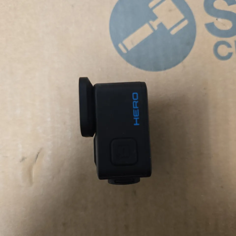GOPRO HERO ACTION CAMERA WITH PROTECTIVE HOUSING AND MOUNTING ACCESSORIES