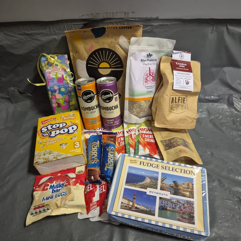 APPROXIMATELY 15 ASSORTED FOOD AND DRINK PRODUCTS TO INCLUDE - TERRYS ORANGE CHOCOLATE - GOODWINS MICROWAVE POPCORN - REMEDY KOMBUCHA - ETC