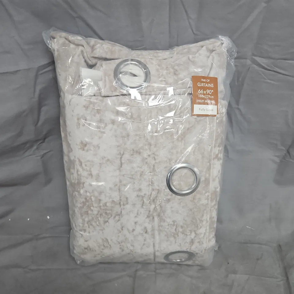 PAIR OF CREAM EYELET CURTAINS – 66X90 INCHES (168X229 CM) – FULLY LINED