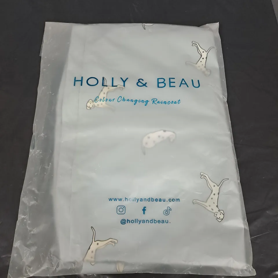 BOX OF APPROXIMATELY 20 HOLLY AND BEAU COLOUR CHANGING RAINCOATS - LIGHT BLUE DALMATIAN - SIZES MAY VARY