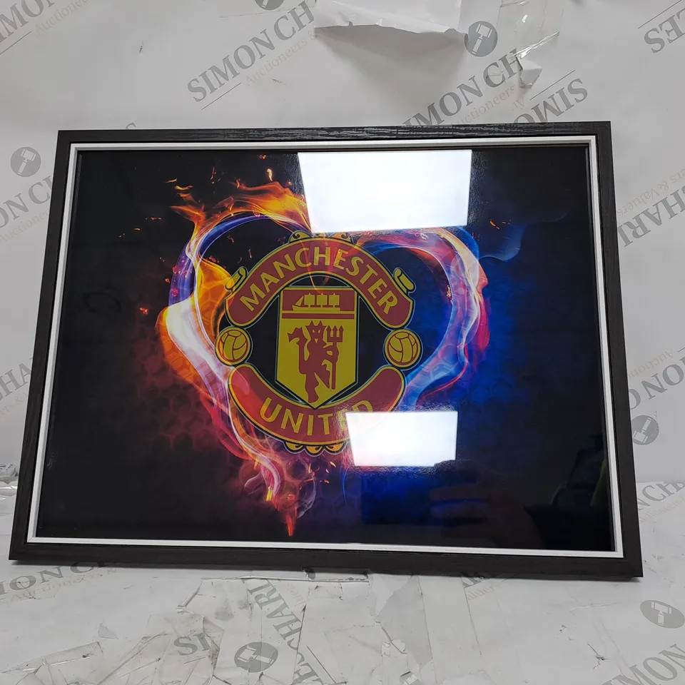 MANCHESTER UNITED FOOTBALL CLUB LOGO IN BLACK FRAME 